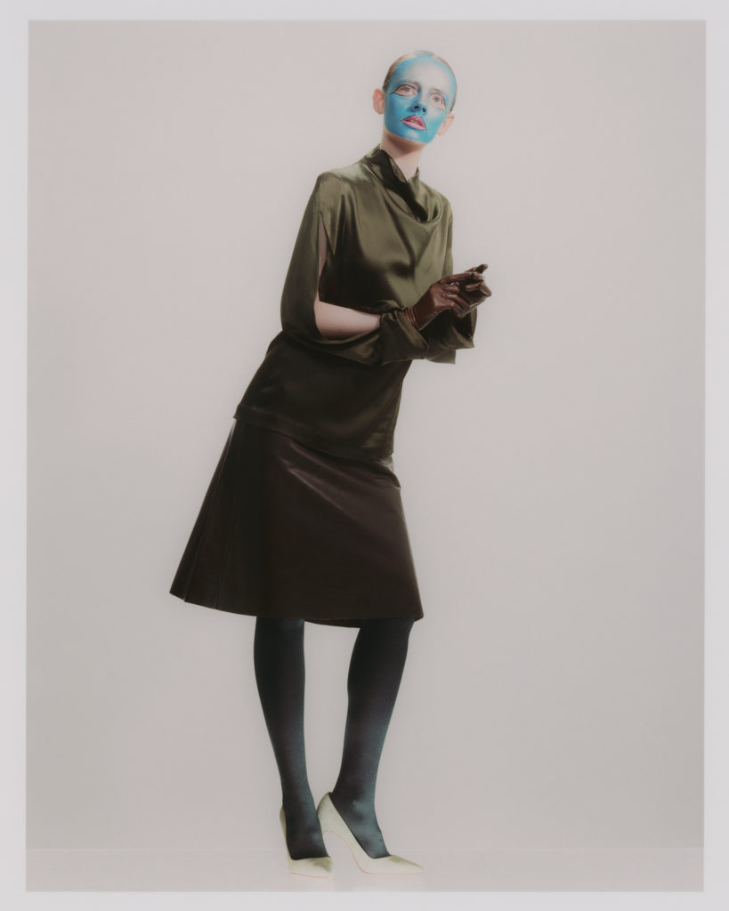 QUINCY WEARS top and skirt DION LEE. gloves VEX CLOTHING. tights WOLFORD. shoes MANOLO BLAHNIK x SALLY LAPOINTE.